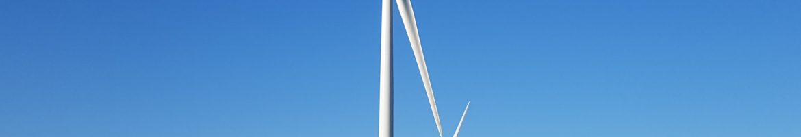 Crédit : Trois éoliennes du parc des Champs Chagnots par Énergie Partagée.